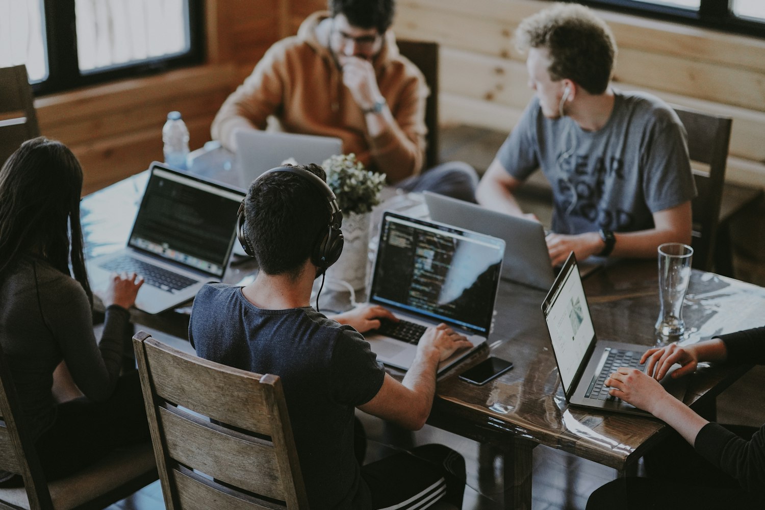 Remote IT service desk team collaborating on support tickets